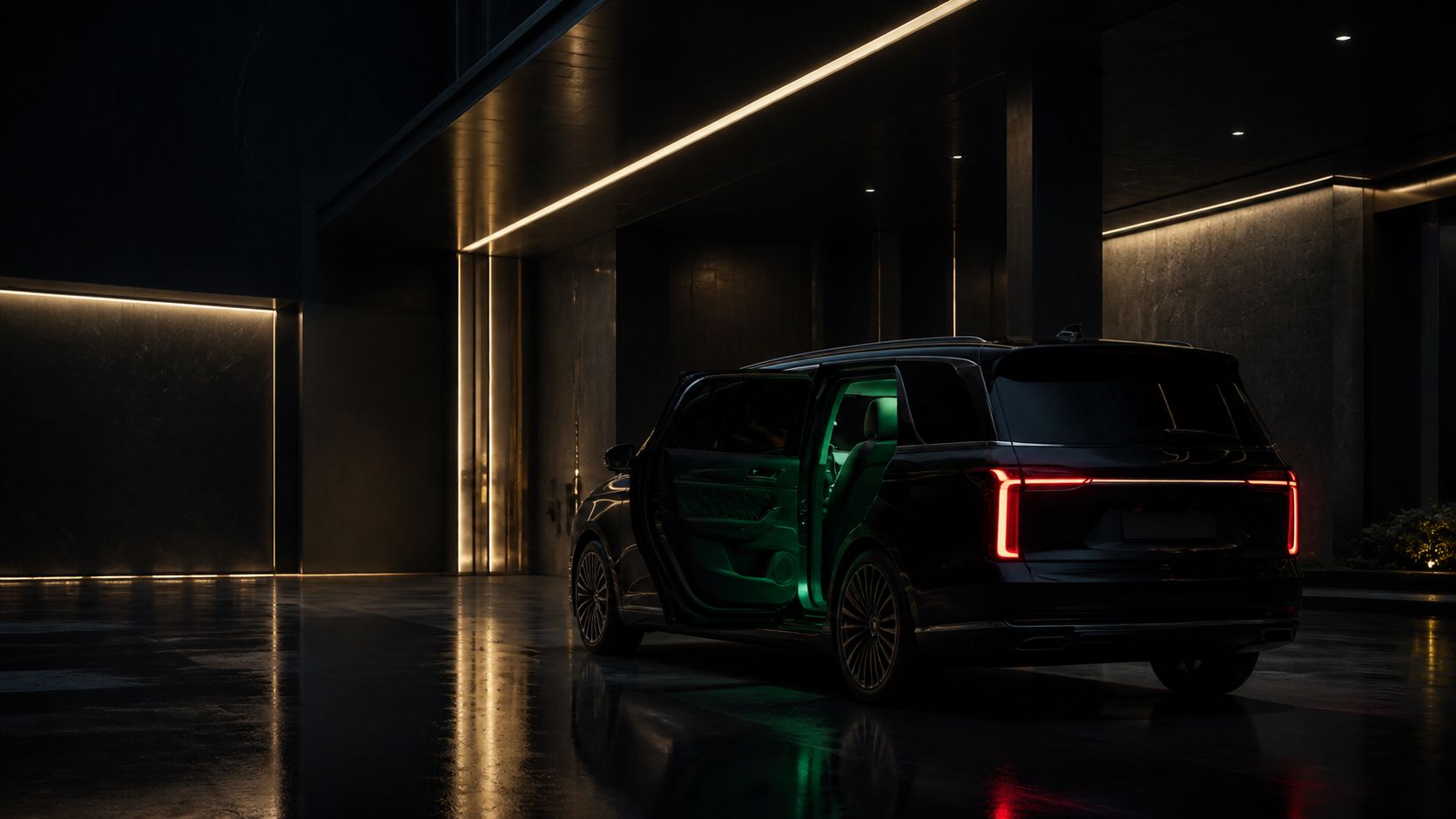An unbranded black luxury vehicle arriving beneath warm gold architecture at night